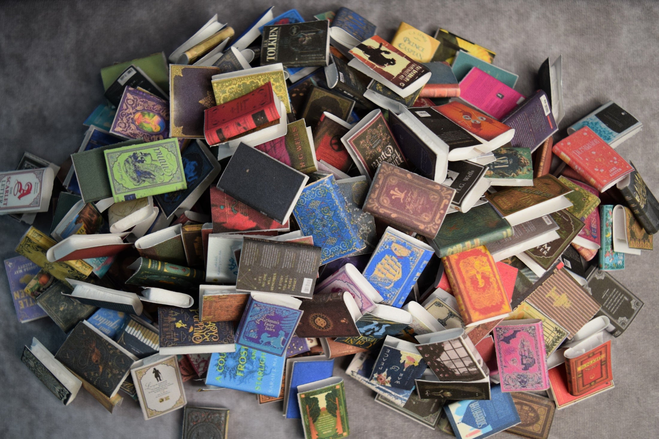 Hand-folded miniature books from Bag O' Books by Shake-A-Shelf